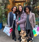 Three Deaf, Black, and beautiful women smiling and leaning in for a photo. From left to right: Heroda Berhane, Haben Girma, and Hermon Berhane.