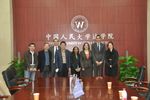 Group photo with officials at Renmin School of Law