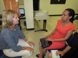 Haben explains assistive technology to senator Judy Buckley