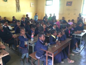 Young children sitting at their desks at the Victory School for the Deaf in Addis Ababa
