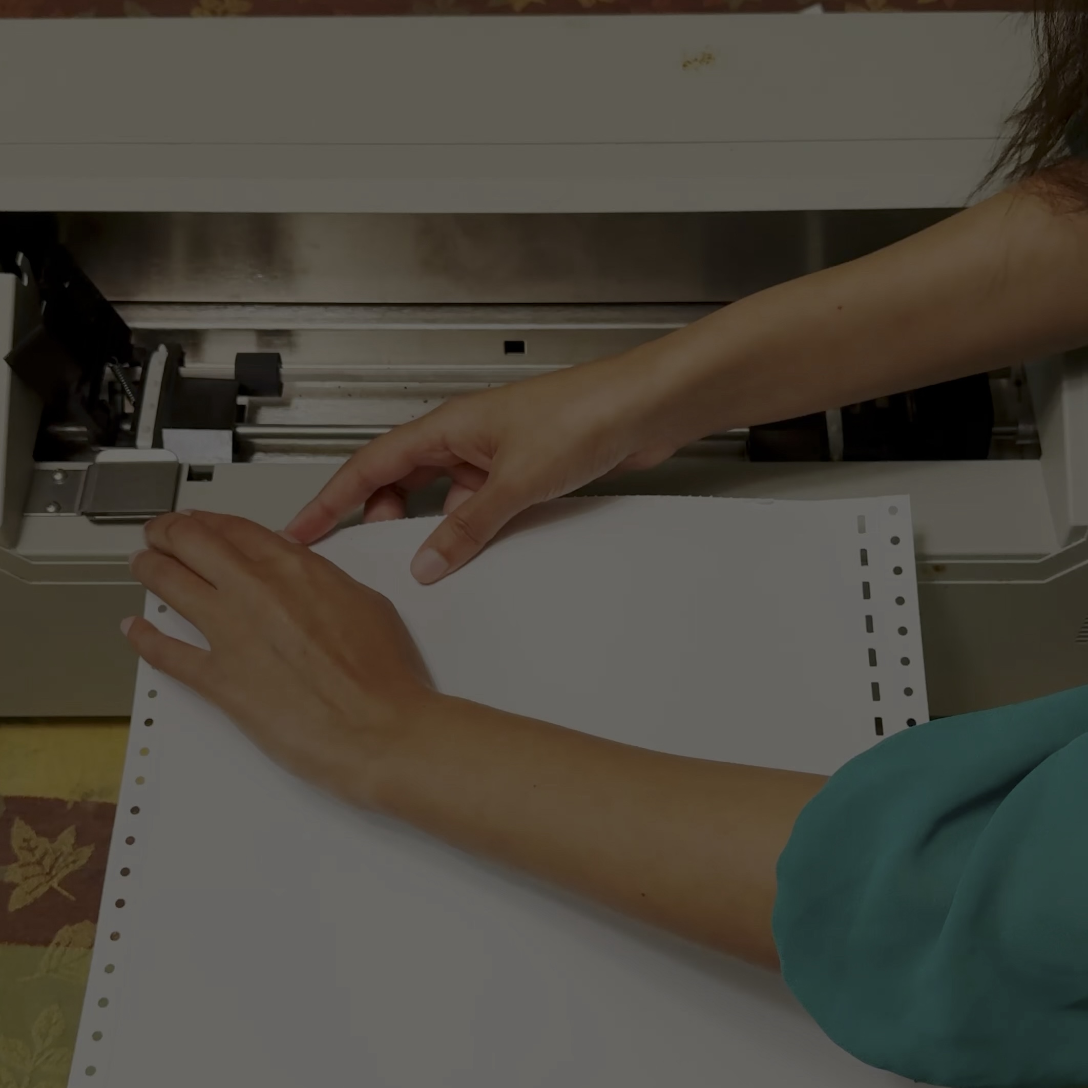 Haben feeds paper into her Juliet Pro Embosser